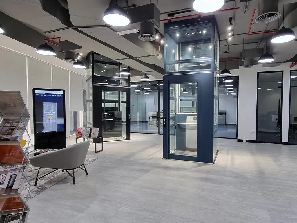 Cibes home elevator showroom in Dubai displaying a modern glass home lift installation.